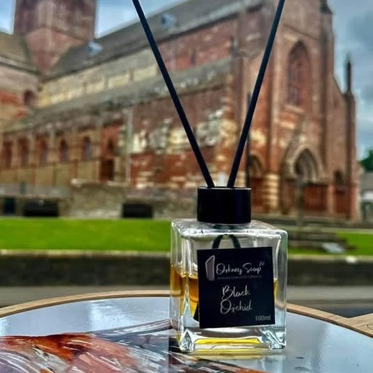 Orkney Soap Black Orchid reed diffuser in front of St Magnus Cathedral, Kirkwall